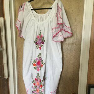 Beautiful  house dress no stains or tears measures 24" pit to pit 47" long